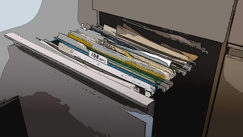 Decorative background - filing cabinet with open bottom drawer